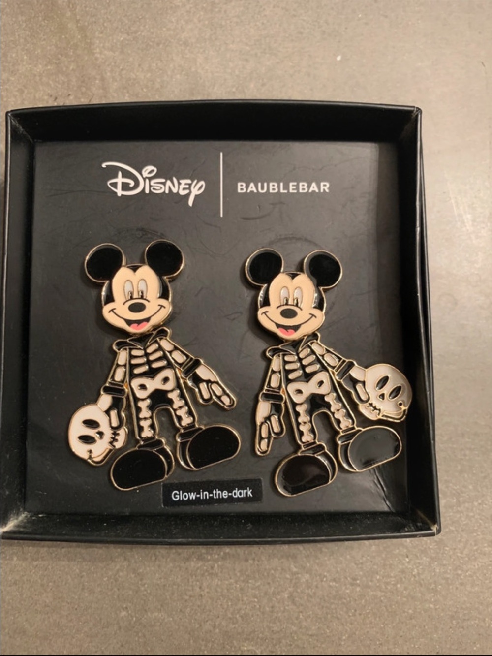 BaubleBar Black and White Mickey Skeleton Glow in the dark earrings